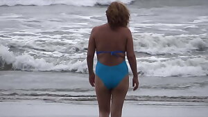 My very excited wife on the beach shows off and masturbates